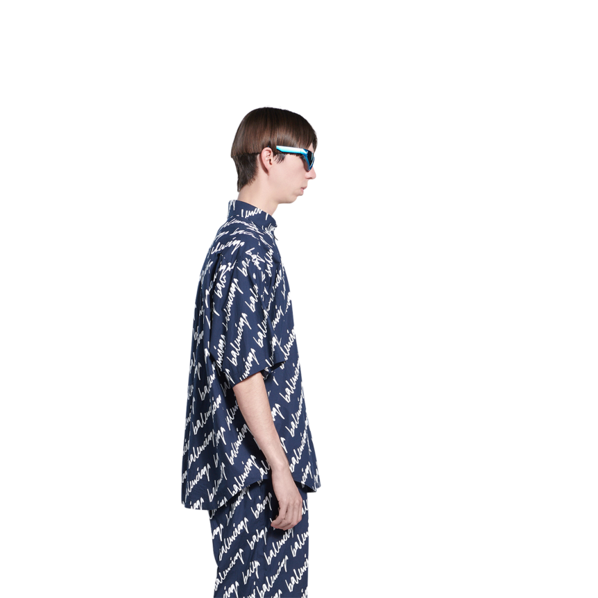 Chemise BALENCIAGA manches courtes bleu marine imprimé allover logo blanc
