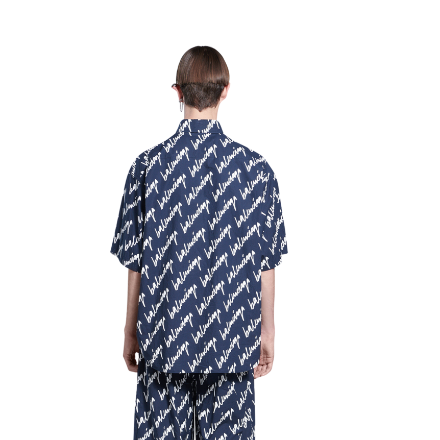 Chemise BALENCIAGA manches courtes bleu marine imprimé allover logo blanc