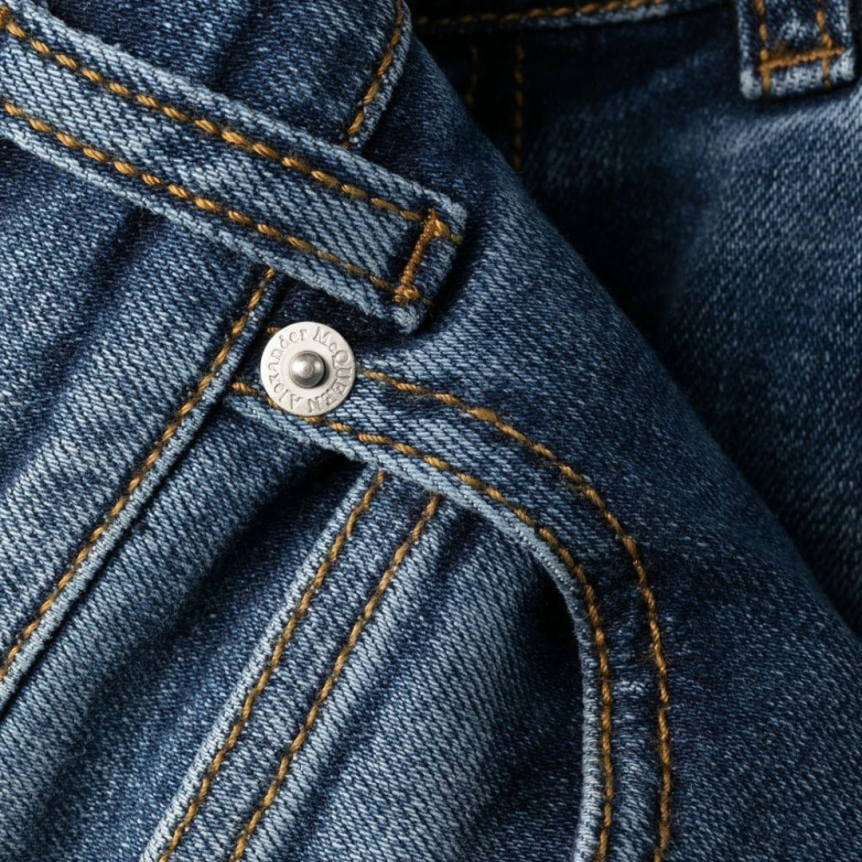 jean flare ALEXANDER MCQUEEN patch logo denim bleu finitions effet usé