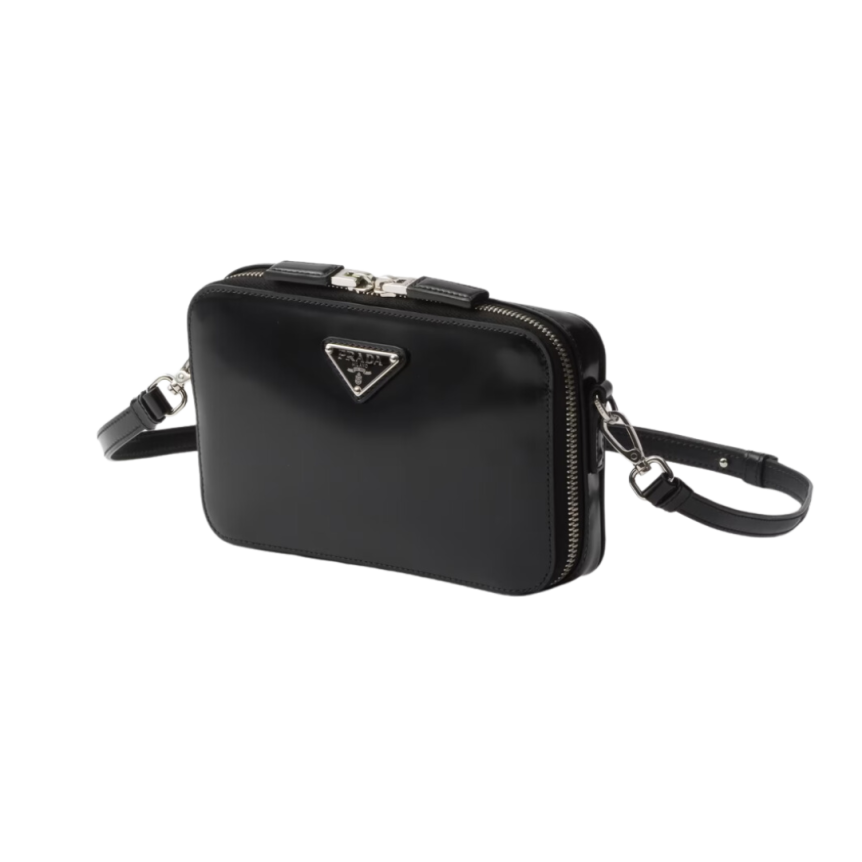 Sac Brique PRADA cuir Saffiano noir bandoulière logo triangle métal