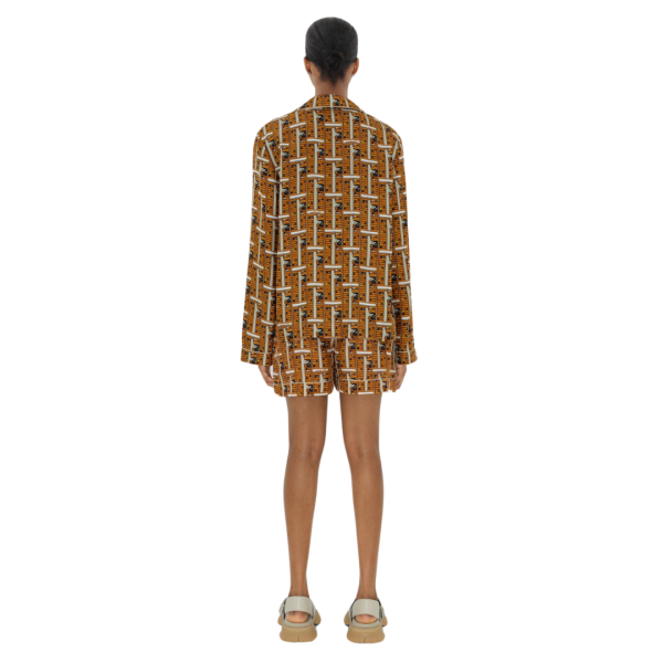 Chemise manche longue BURBERRY pyjama soie orange imprimé bus marron