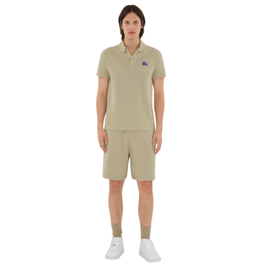 Polo manche courte BURBERRY coton piqué beige broderie chevalier bleu