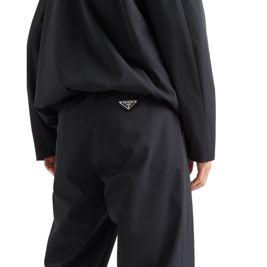 Pantalon PRADA tissu technique stretch noir fente zippée