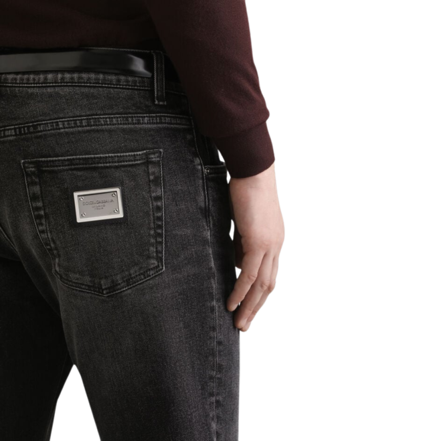 Jean slim DOLCE & GABBANA coton stretch noir délavé logo plaque métal