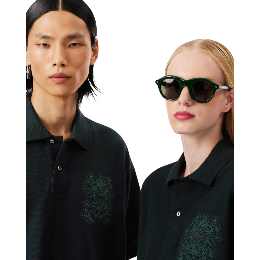 Polo manche courte LACOSTE Défilé loose fit coton piqué vert foncé broderie blason