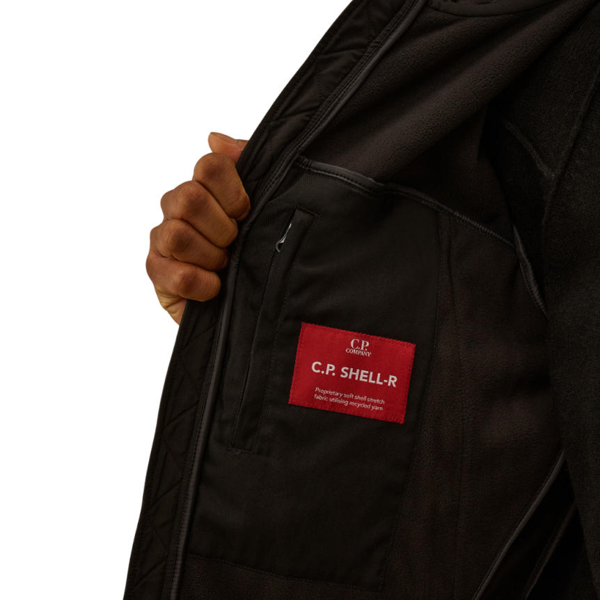 Blouson CP COMPANY Shell-R nylon noir capuche lunettes