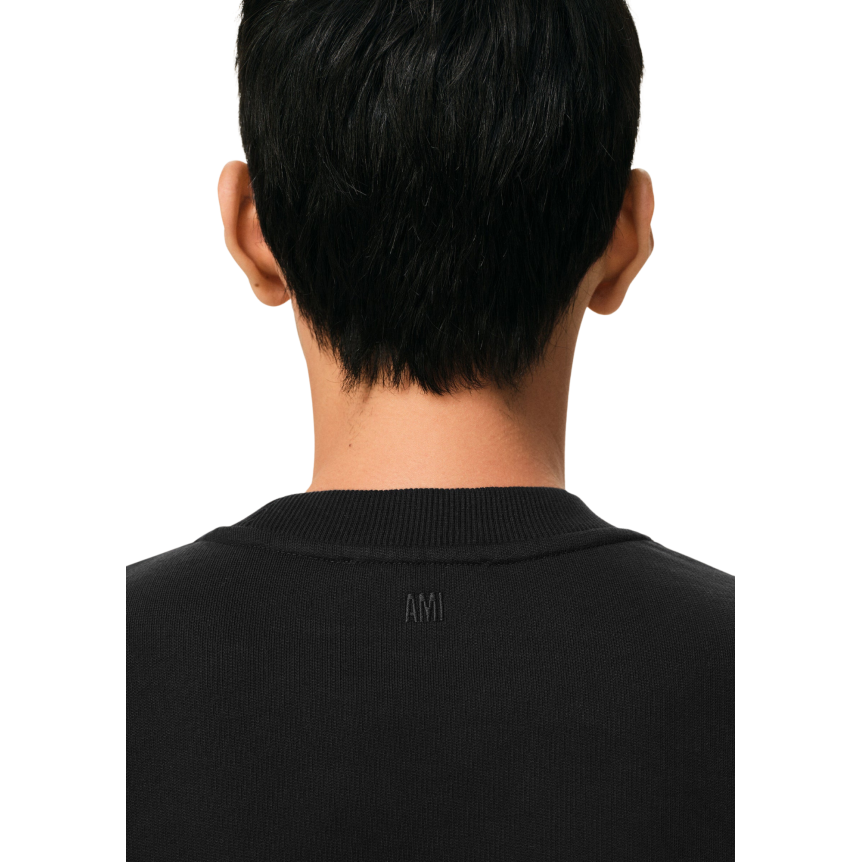 Pull col rond AMI Paris molleton coton noir cœur blanc