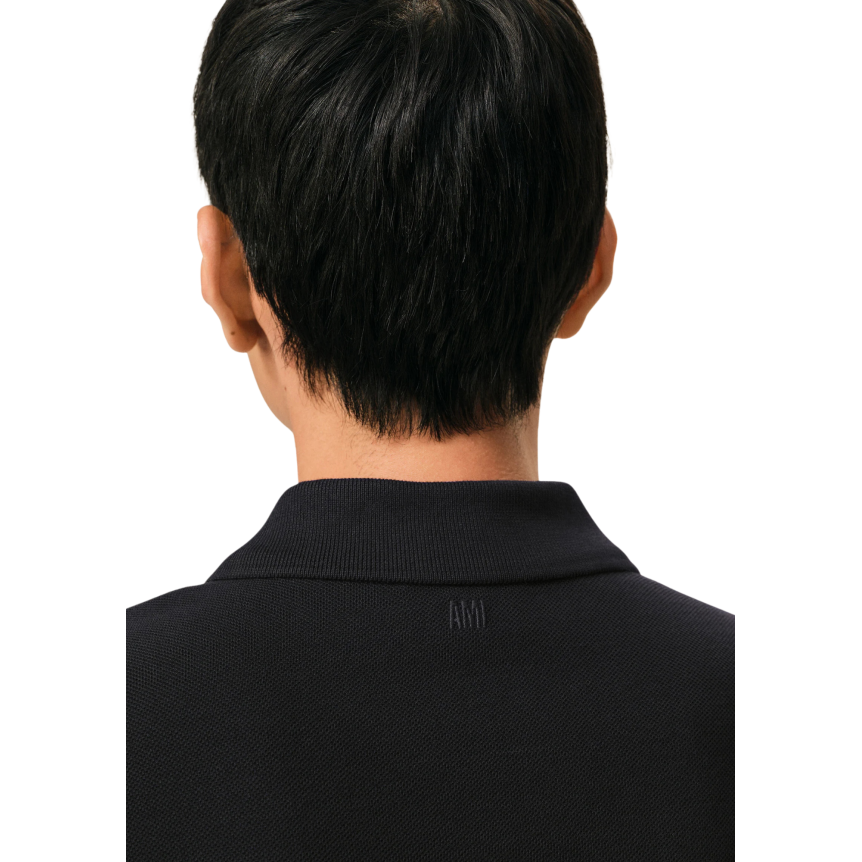 Polo manche courte AMI Paris piqué de coton noir broderie cœur blanc