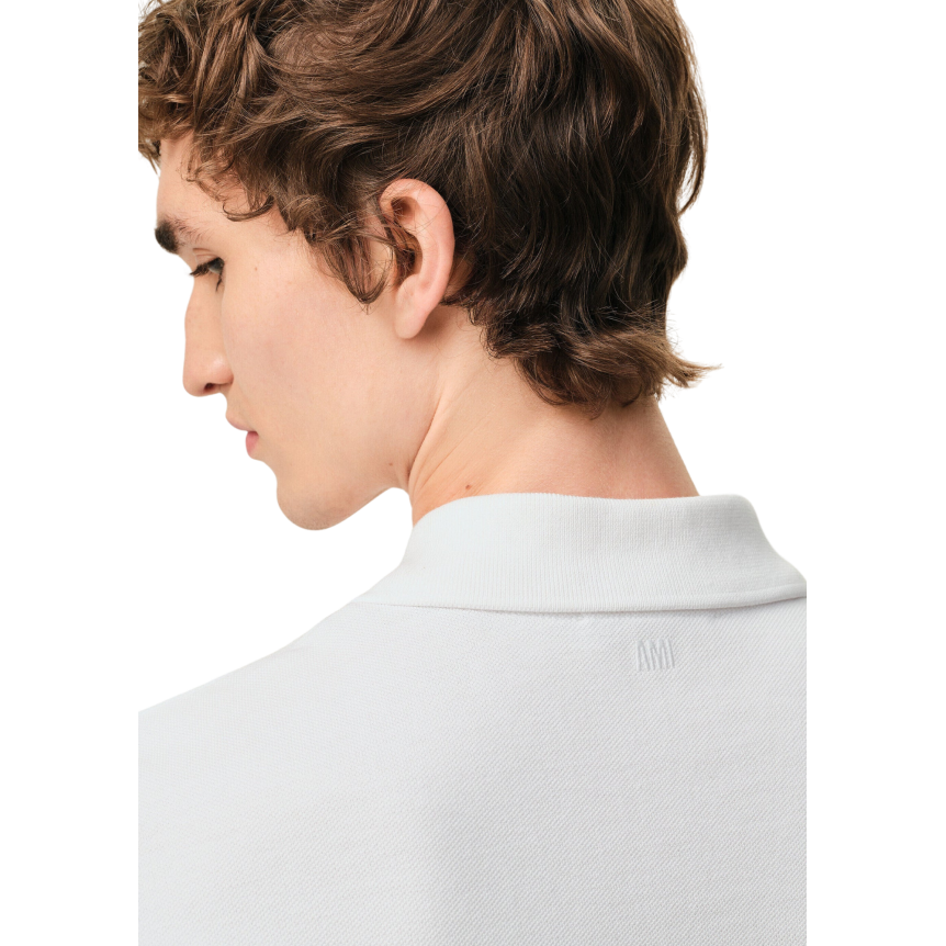 Polo manche courte AMI Paris piqué de coton blanc broderie cœur noir