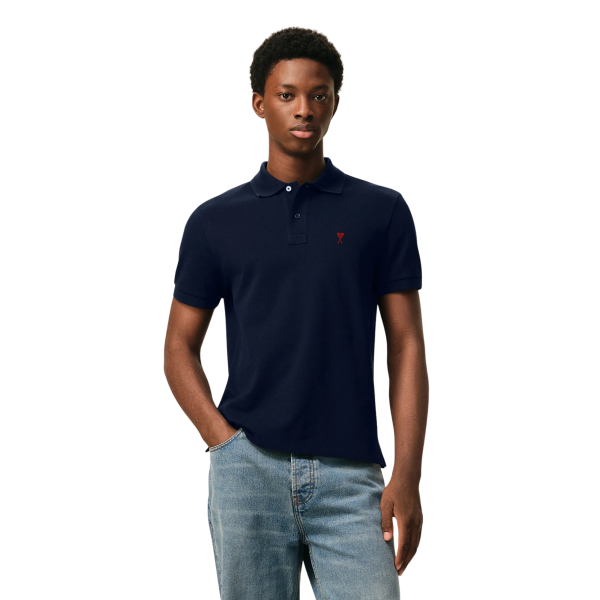 Polo manche courte AMI Paris piqué de coton bleu marine broderie cœur rouge