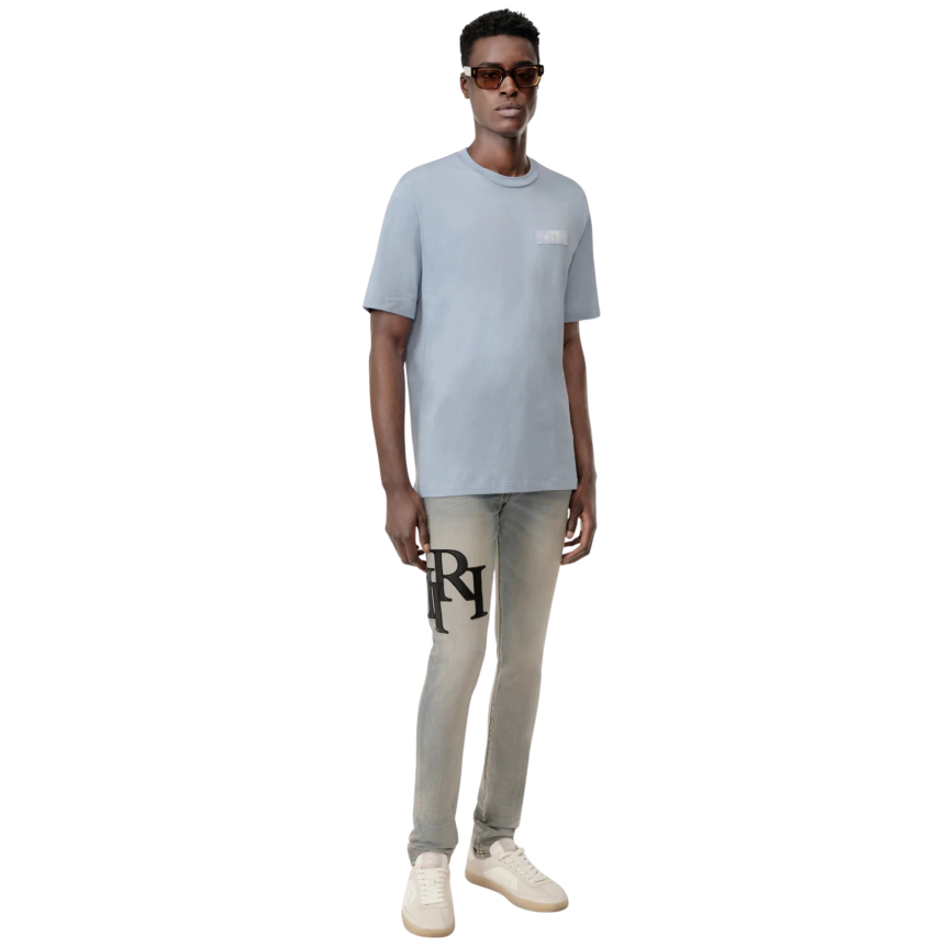 Jean 5 poches Skinny coton denim bleu clair AMIRI cuir noir