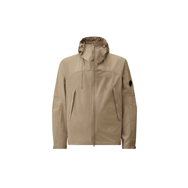 Blouson zippé à capuche CP COMPANY Pro-Tek gris beige lentille poche manche