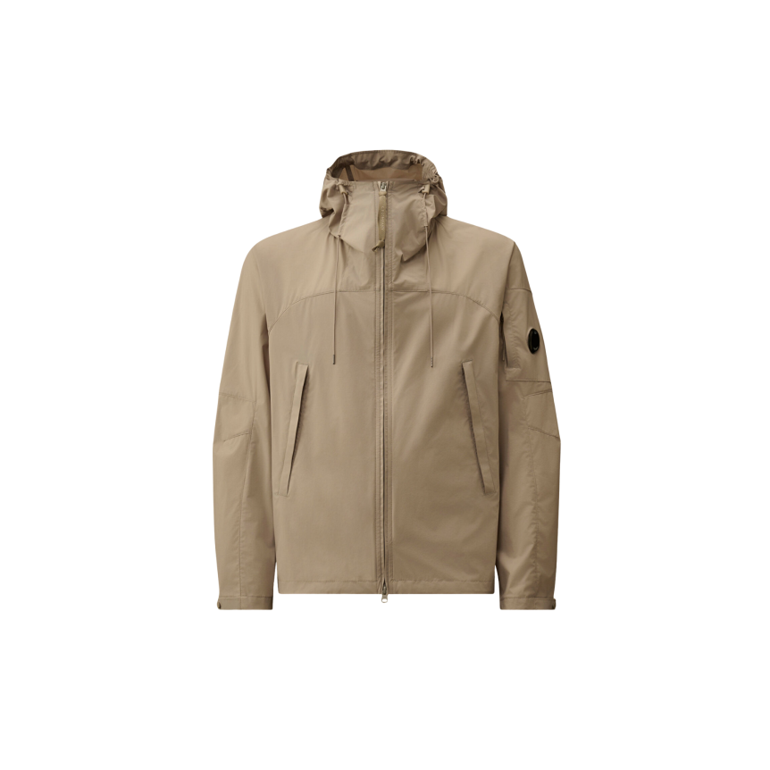 Blouson zippé à capuche CP COMPANY Pro-Tek gris beige lentille poche manche