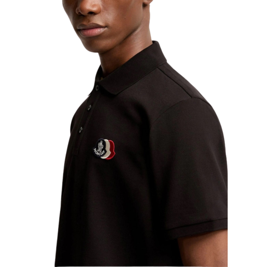 Polo MONCLER piqué de coton noir empiècement logo tricolore