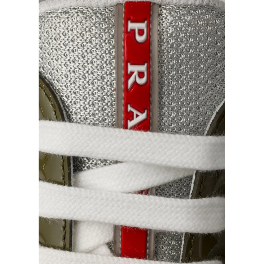 Basket basse Sneaker PRADA America’s Cup cuir verni kaki tissu technique