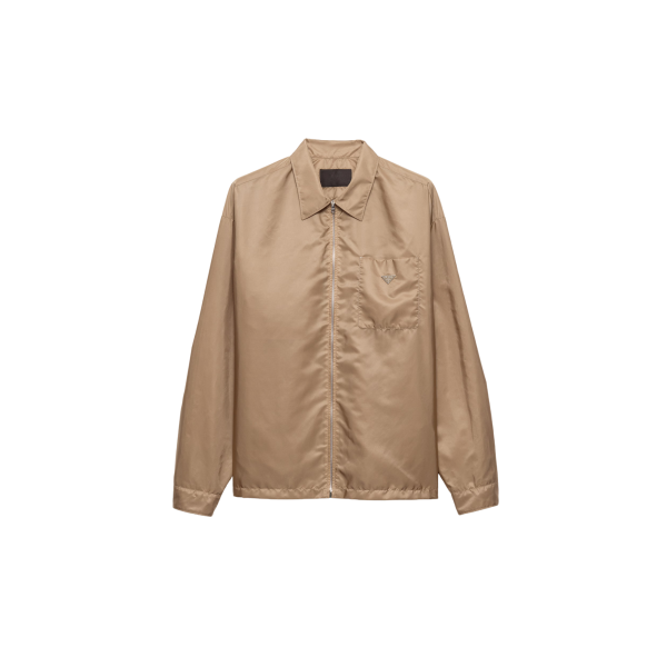 Chemise zippée PRADA à col Re nylon beige triangle métal émail poitrine