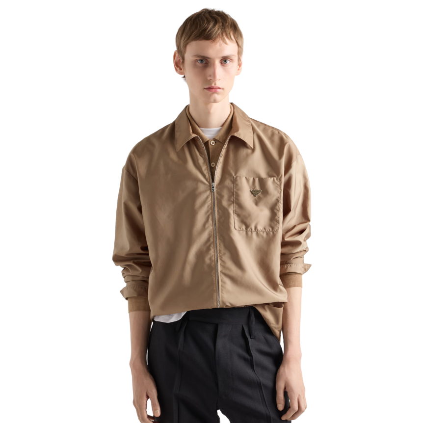 Chemise zippée PRADA à col Re nylon beige triangle métal émail poitrine
