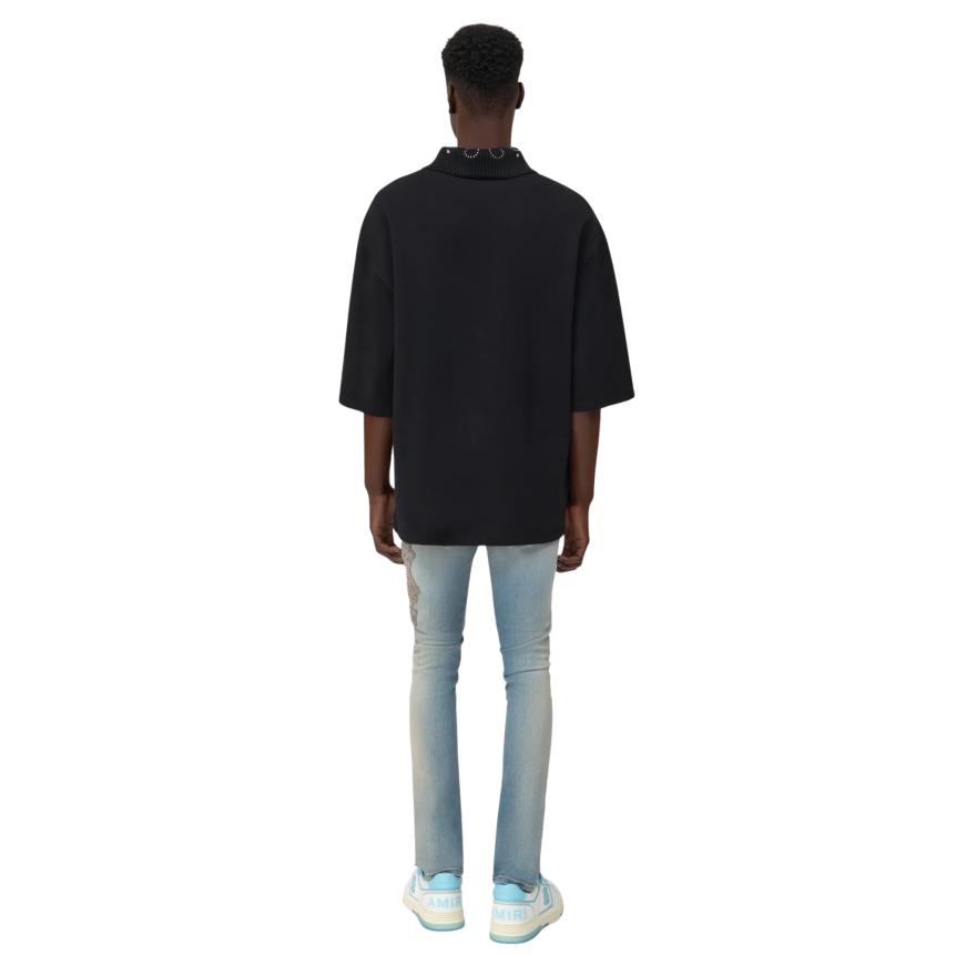 Jean skinny AMIRI denim stretch bleu délavé broderie MA QUAD