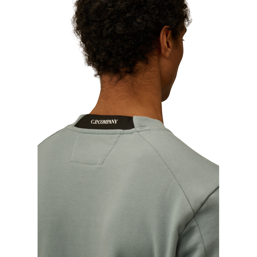 Sweat-shirt CP COMPANY col rond polaire motif diagonal relief bleu argenté