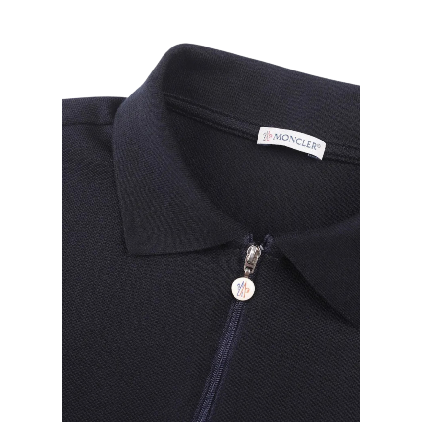 Polo MONCLER piqué de coton bleu marine col demi zip bas nylon