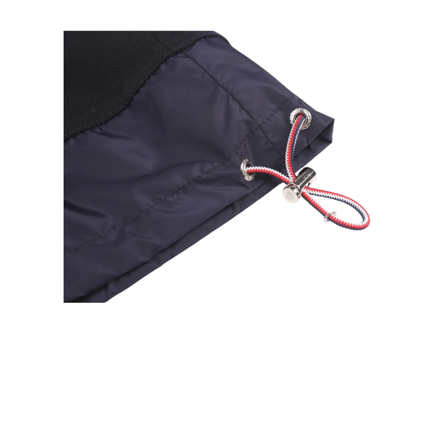 Polo MONCLER piqué de coton bleu marine col demi zip bas nylon