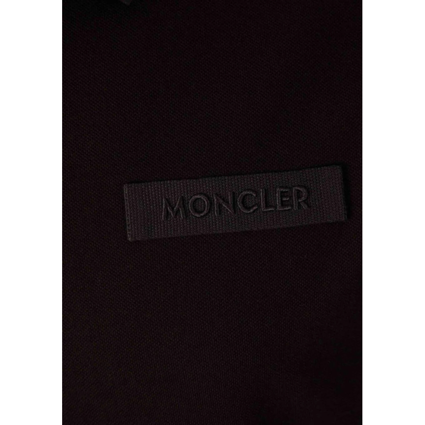 Polo MONCLER coton piqué noir boutons cachés