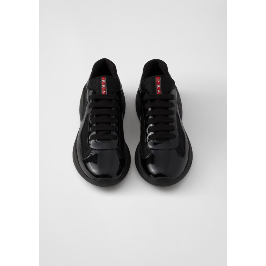 Sneaker PRADA America’s Cup en cuir verni noir