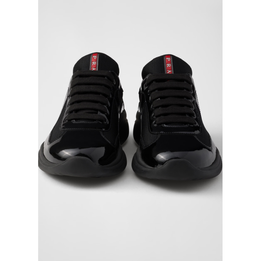 Sneaker PRADA America’s Cup en cuir verni noir