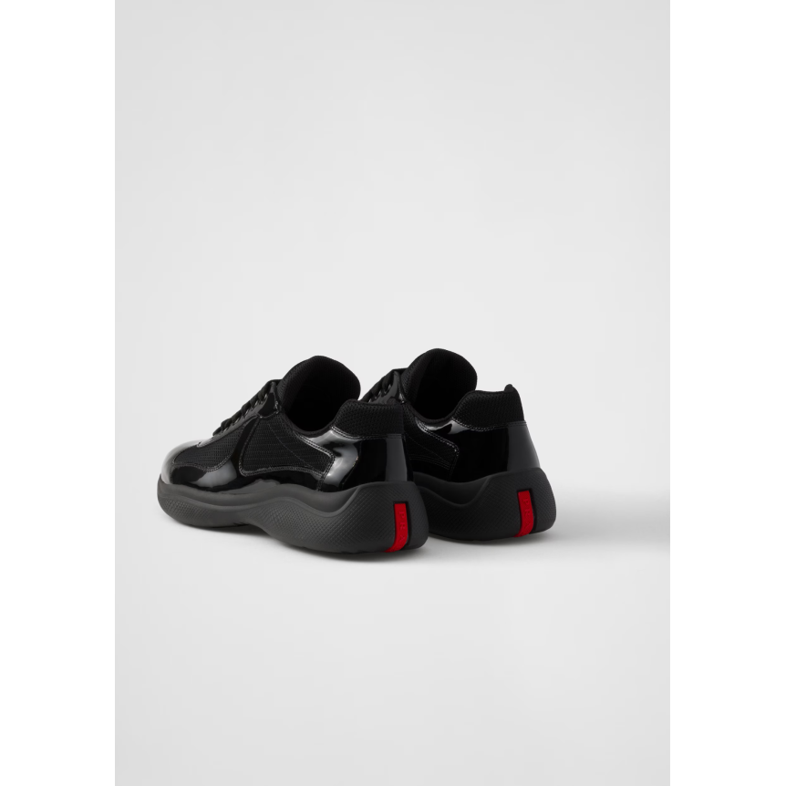 Sneaker PRADA America’s Cup en cuir verni noir