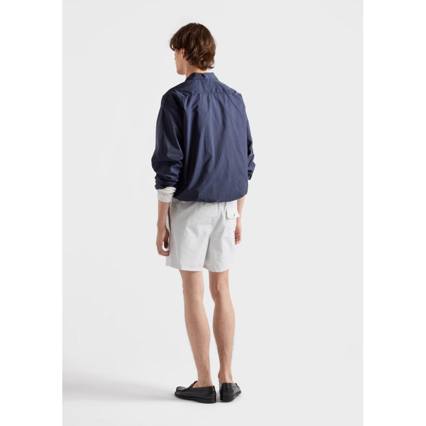 PRADA Blouson col chemise ample zippée en nylon Re bleu marine logo triangle métal émail