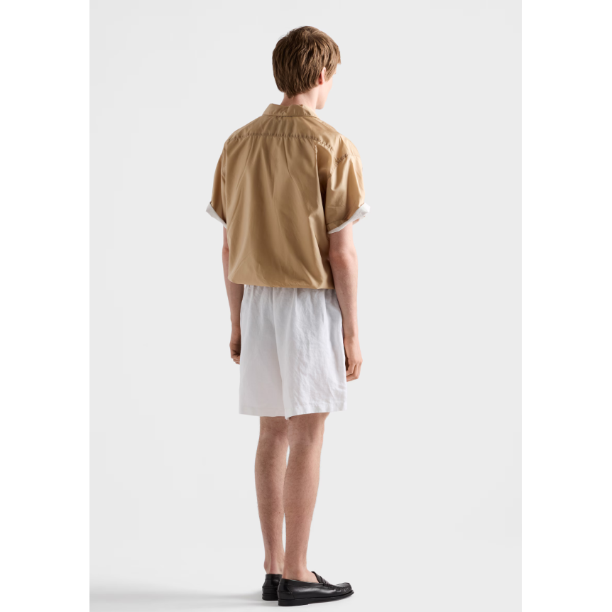 Chemise zippée manche courte PRADA en nylon Re camel logo triangle métal émail