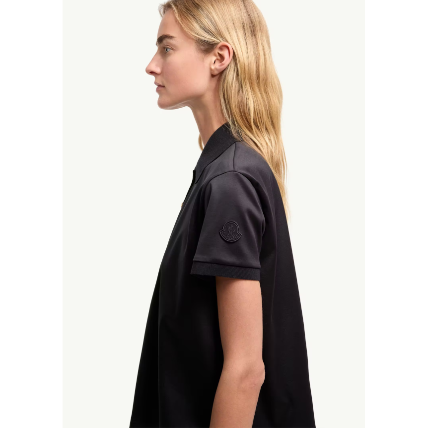 Polo court ample MONCLER coton bleu marine bouton pression doré