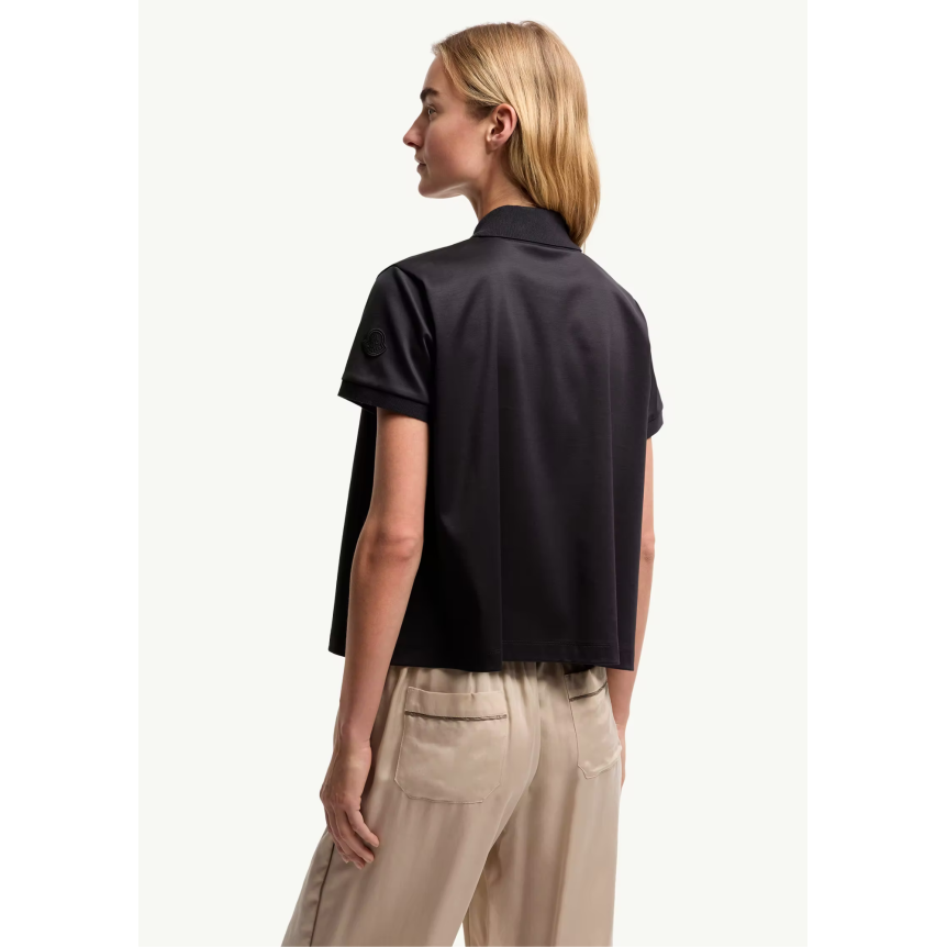 Polo court ample MONCLER coton bleu marine bouton pression doré