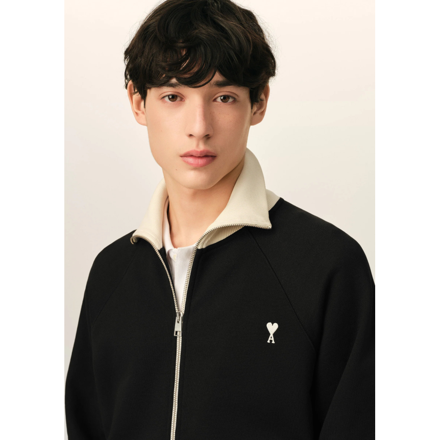 Sweat-shirt zippé AMI Paris en molleton de coton léger non gratté noir bordure col écru broderie cœur blanc