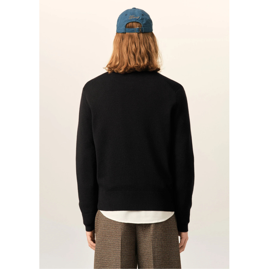 Pull col rond AMI Paris en maille laine mérinos noir broderie cœur noir