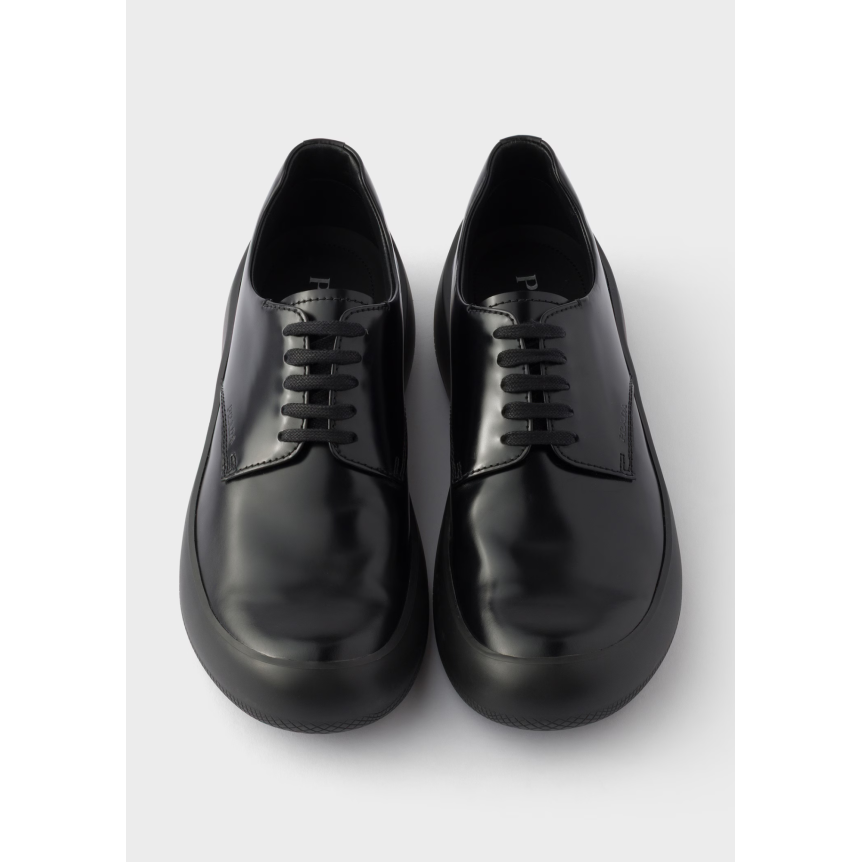 Derbies à lacets PRADA en cuir de veau  brossé noir