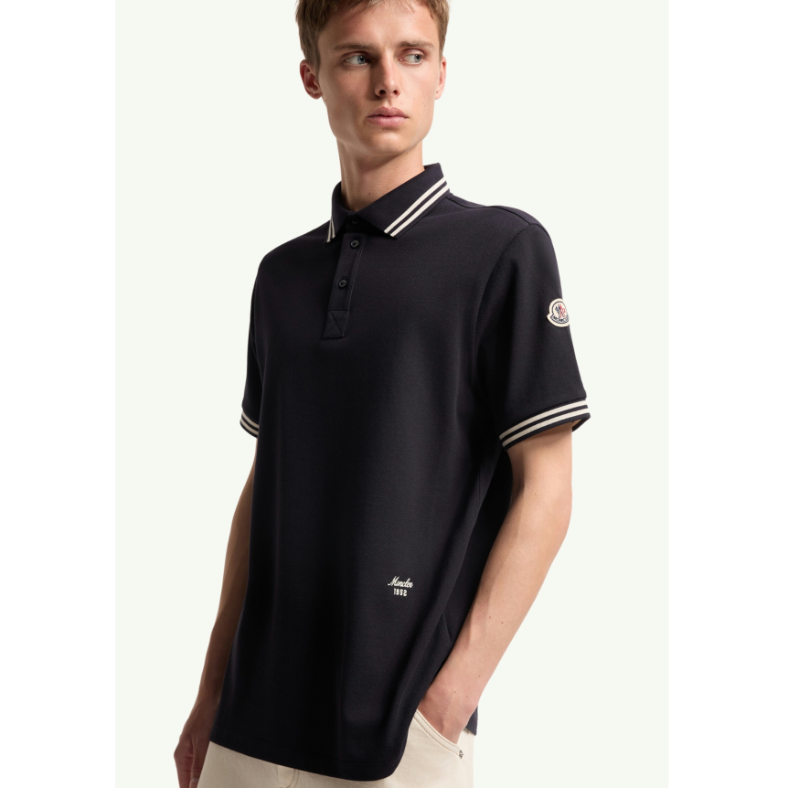 Polo MONCLER piqué de coton noir poche poitrine liseret cuir logo
