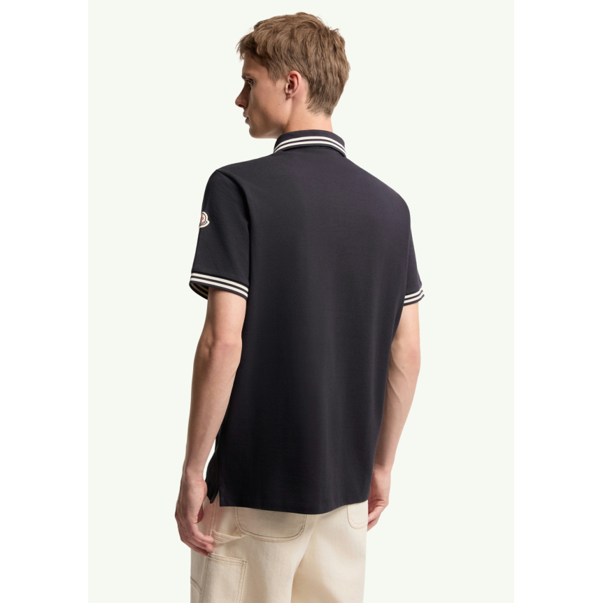 Polo MONCLER piqué de coton noir poche poitrine liseret cuir logo
