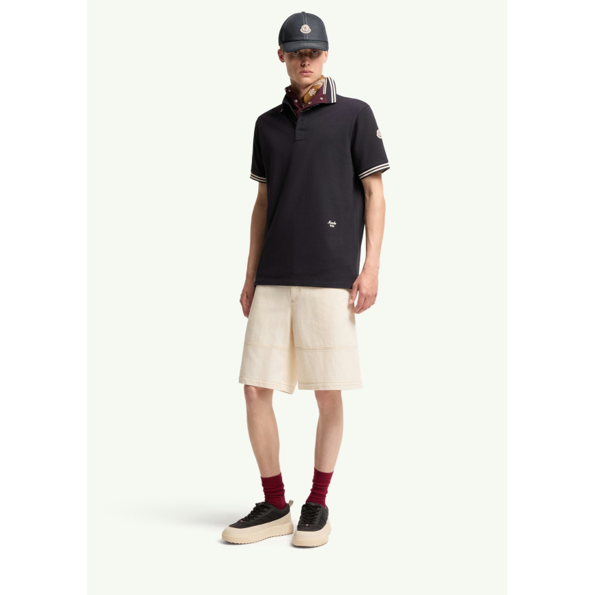 Polo MONCLER piqué de coton noir poche poitrine liseret cuir logo
