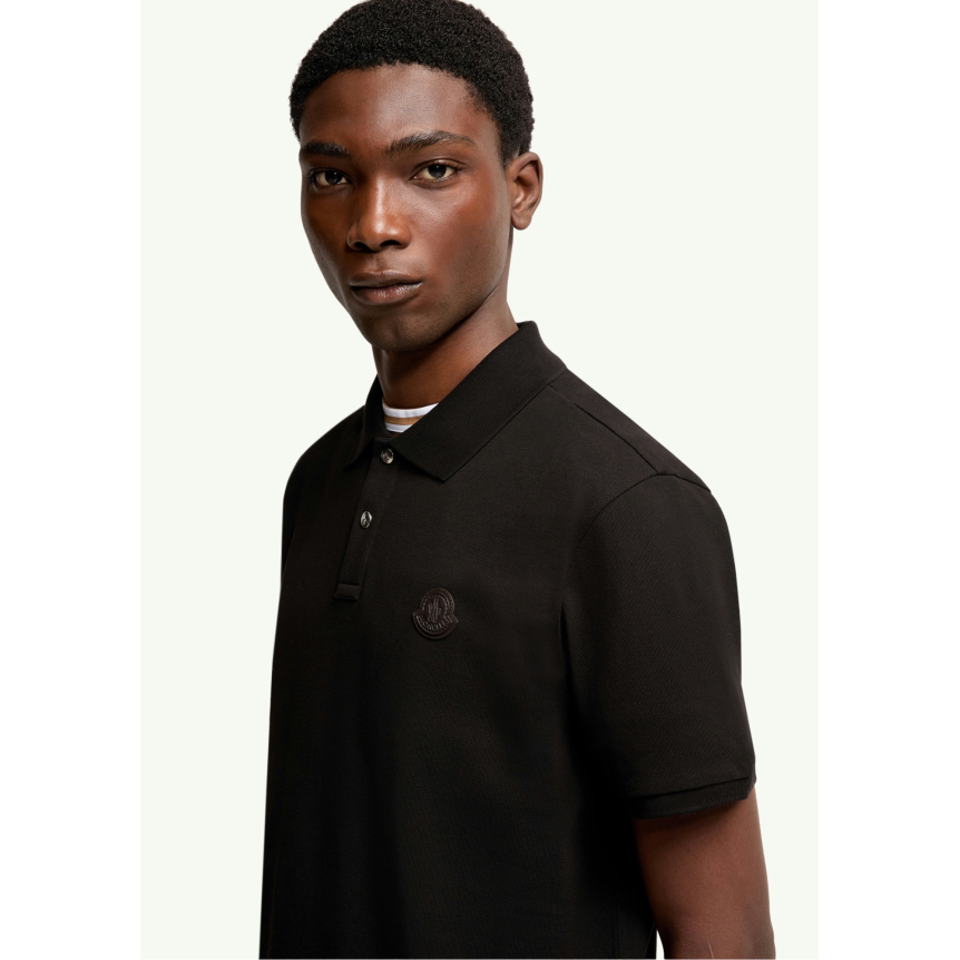 Polo MONCLER en piqué de coton noir broderie logo cuir noir