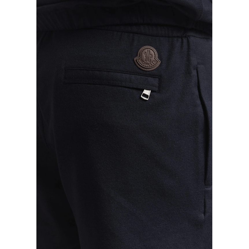 Pantalon ample MONCLER en flanelle laine mélangée bleu marine à logo en cuir